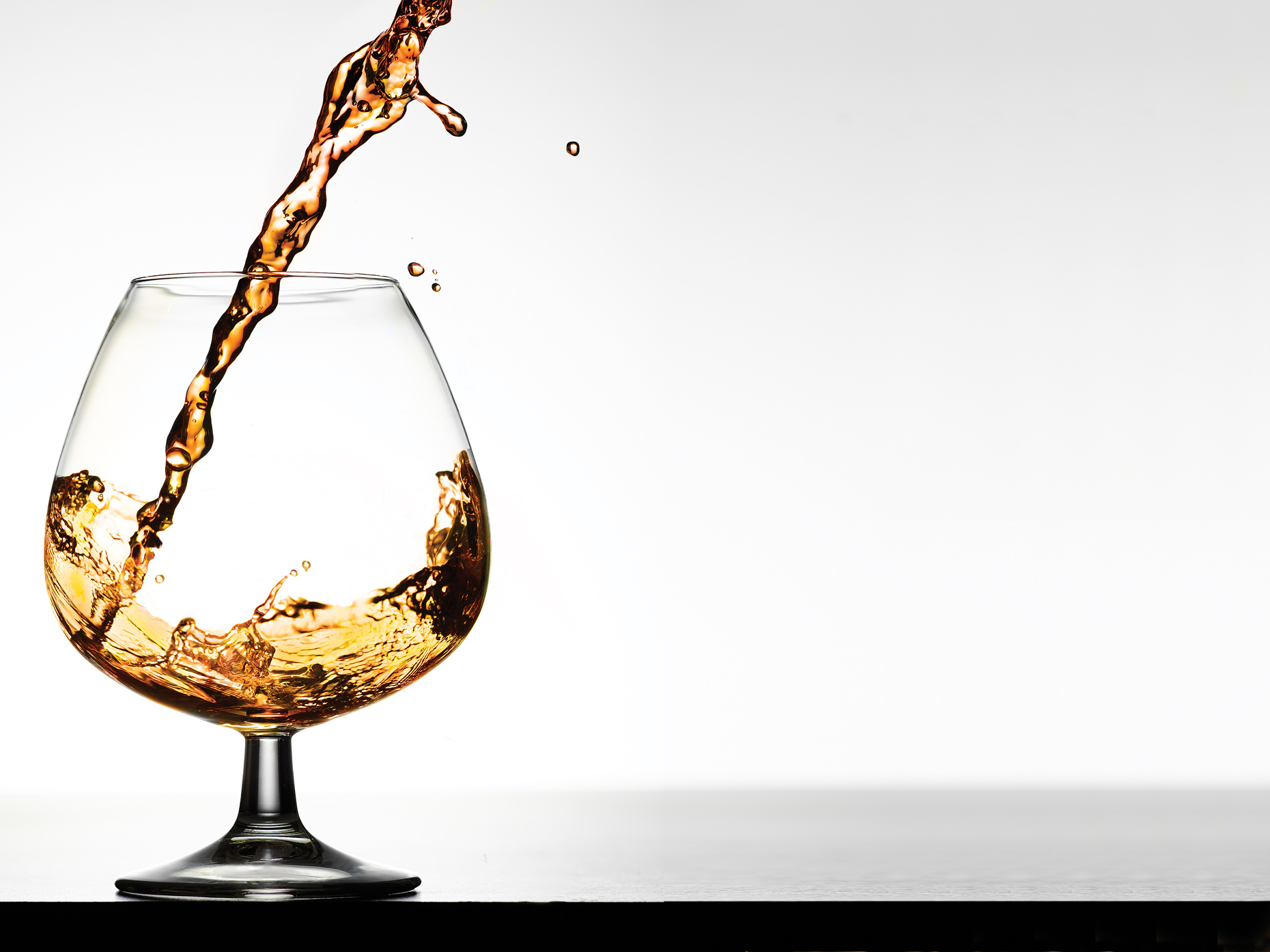 Cognac- Pouring cognac- Henrique Du Tiel